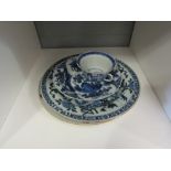 A Chinese export blue and white dish, label verso, 16cm diameter. Also, two plates and a cup (4)