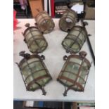 Six hanging metal and glass lanterns