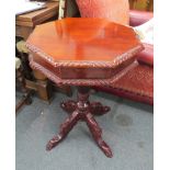 A reproduction octagonal hardwood sewing table, lid opens to reveal nine lidded compartments, 52cm x