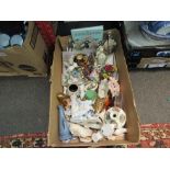 Two boxes of ornaments and figures including miniature shoes
