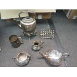 A selection of plated wares including spirit burning kettle, teapot, toast rack etc.