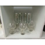 Drinking glasses including champagne flutes, large wine and brandy balloons