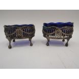 A pair of Georgian silver table salts with Bristol blue glass liners a/f