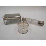 A silver topped dressing table container, a silver napkin ring and a double-ended scent bottle (3)