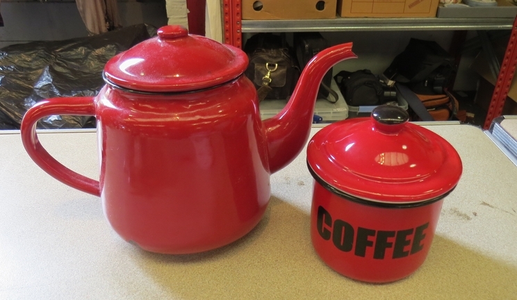 A red enamel tea/coffee pot and similar coffee canister