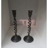 A pair of open barley-twist candlesticks, 25cm tall