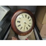 A late 19th Century postman's alarm clock with glass bezel, two weights and a pendulum