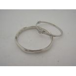 Two bangles both stamped 925, one set with clear stones