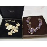 Two boxed handcrafted floral necklaces