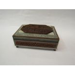 An Anglo Indian carved wooden box, heavily carved with wooden deities, micro-mosaic border, on