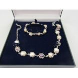A pearl suite of jewellery comprising bracelet and necklace