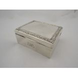 A silver card box marked Chester, forun decoration, monogrammed, 5cm tall x 11xm wide 9cm deep