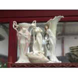 Two figural vases, one being Union Studio porcelain and a Fast Times figure of a girl standing on