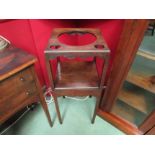 A George III oak two tier gentleman's washstand on internal chamfered legs. 34cm W, 34cm D, 80cm H