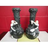 A late 19th / early 20th Century pair of Bernard Block porcelain figural vases, 39cm height