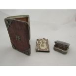 A crocodile card case with silver mounts, central monogrammed letter 'M' marked Birmingham 1930, a