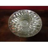 A silvered three dimensional effect shallow form bowl, 32cm diameter
