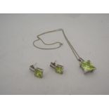 A pair of earrings with bright green square stone with matching pendant, stamped 925, hung on chain