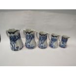 A graduated set of five iron stone blue and white 'Victoria Ware' jugs, Art Nouveau style