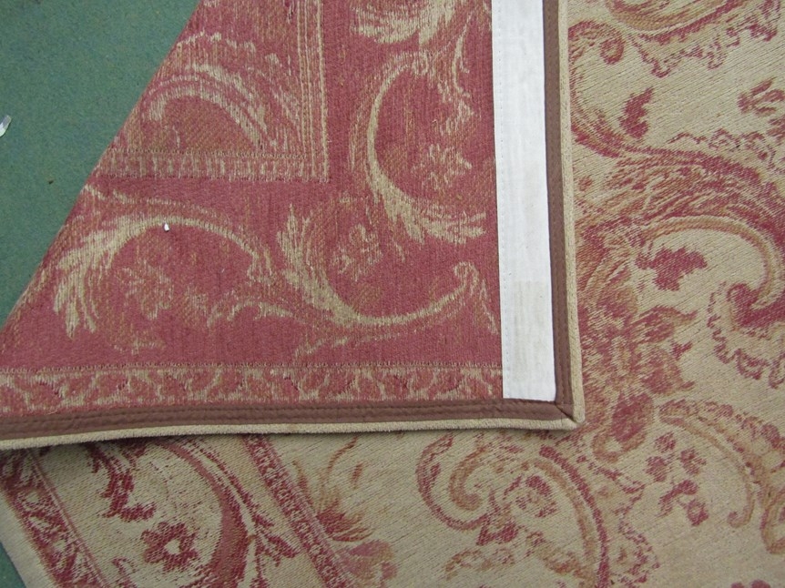 A Laura Ashley rug in yellow/beige and reds - Image 2 of 2
