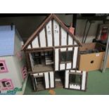 A handmade Tudor style dolls house