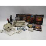 A Commodore Amiga A600 together with mouse, joysticks, power supply and games