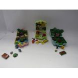 Three Tomy Pokemon Polly Pocket playsets to include Evee and Charmander, Pikachu and Oddish,