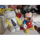 A plastic Mickey Mouse and a battery operated Cats toy (2)