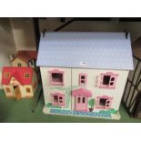 A wooden dolls house and two plastic examples (3)