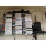 Two Sony PlayStation 2 Slimline computer games consoles, six controllers, two memory cards and a