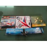 Four assorted radio controlled model aircraft kits to include Nine Eagles Sky 500 (x2), Nine