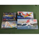 Four assorted boxed radio controlled model aircraft to include Ripmax Firebird XL, Joysway Eaglet