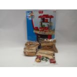A collection of Brio wooden train toys and a Junior Chef My 1st Kitchen set