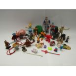 Assorted vintage playworn action figures including Sungold bootleg Mummy, Captain Planet,