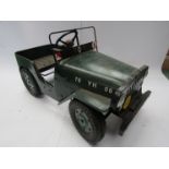 A Tri-ang military Jeep pressed tin pedal car with folding windscreen