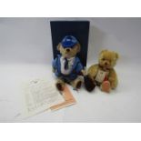 A Herman Berlin Wall bear and a Prue Theobald 'Theo' bear, boxed (2)