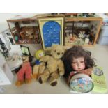 A quantity of vintage toys including bagatelle, tedyy and German porcelain dolls head