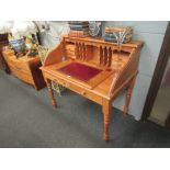 A burr maple writing slope with tooled red leather inserts