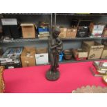 A resin bronze Mother and Child figure, 34cm tall