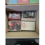 Four boxes of books on photography, optics, microscopes, etc