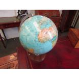 A mid-20th Century 30cm scan globe on single gimble