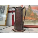 An Arts and Crafts copper vase, 31cm height drilled base