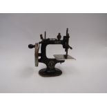 A miniature Singer sewing machine
