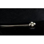 A pearl and old cut diamond set stick pin, unmarked, in fitted case, 2g