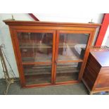 A Victorian mahogany two door china display cabinet on raised stand. 132cm x 141cm x 27cm not