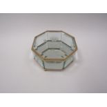 A mirrored bevelled glass jewellery box on metal feet, 14cm diameter