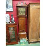 An oak cased long case clock with S Scholfield, Barnsley eight day chiming mechanism with key,