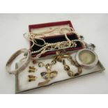 A silver bangle, Ingersoll stopwatch, faux pearls and Thai suite of jewellery