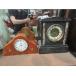 An Edwardian style slate and marble mantel clock with cracked chapter ring, with pendulum and