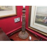 An Italian hardwood carved table lamp with leaf design, 74cm tall